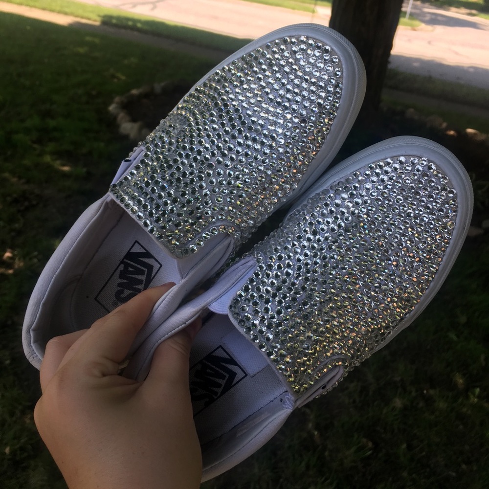 Women’s white slip on vans, hand bedazzled.